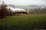 18. April 1987. 50 3673. Wechselburg. . Sachsen / 50 3573 mit dem morgendlichen Personenzug von Karl-Marx-Stadt nach Rochlitz kurz vor dem Bahnhof Wechselburg.